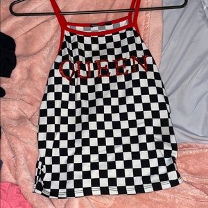 A checkered Queen crop top